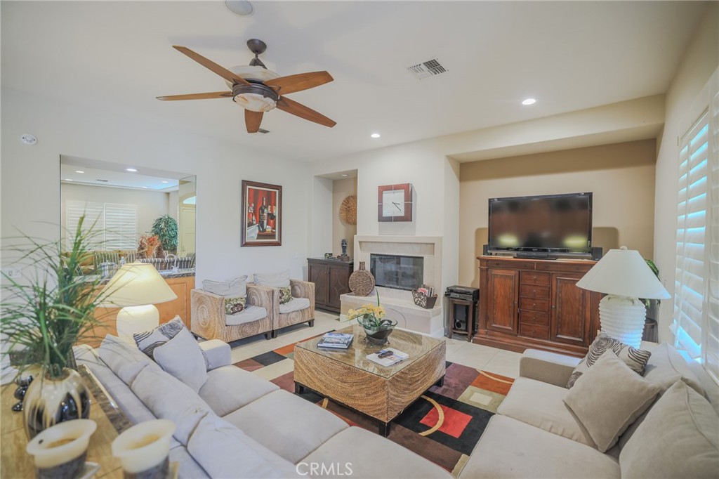 17 Bellisimo Court Rancho Mirage, CA 92270 - Photo 10 of 41 a living room with furniture and a flat screen tv