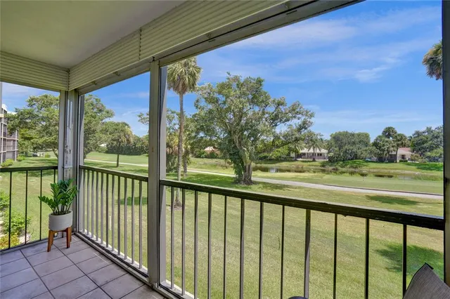 a view of balcony with furniture