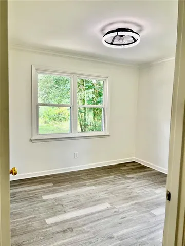 a front view of a house with yard