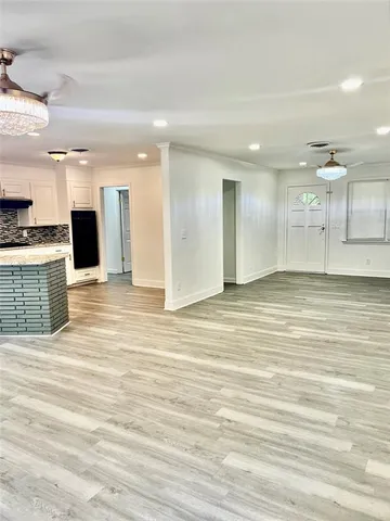 a view of a kitchen with a sink