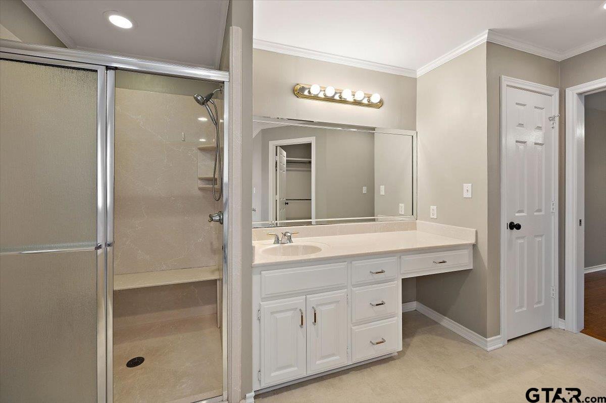 142 Parrish Rusk, TX 75785 - Photo 16 of 43 a spacious bathroom with a shower sink and mirror