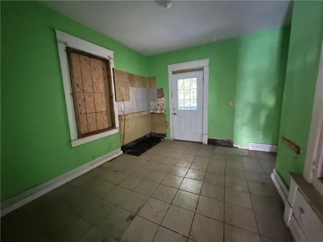 a view of kitchen with window and furniture