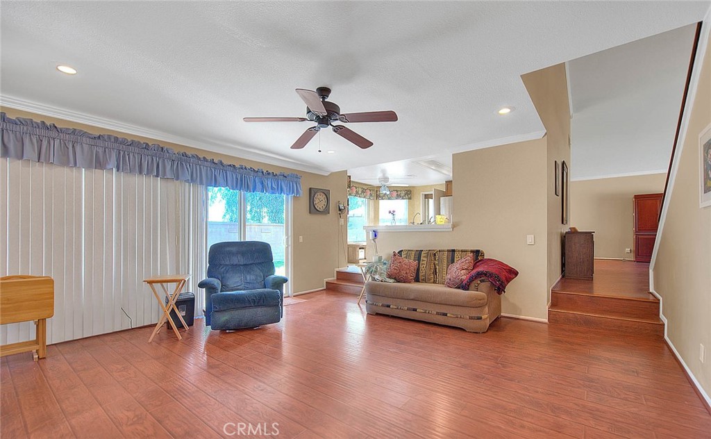 32 Rising Hill Road Phillips Ranch, CA 91766 - Photo 15 of 63 a living room with furniture and a large window