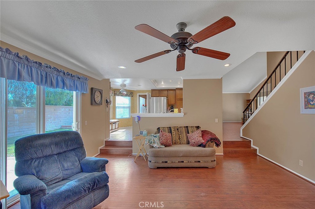 32 Rising Hill Road Phillips Ranch, CA 91766 - Photo 19 of 63 a living room with furniture and a large window