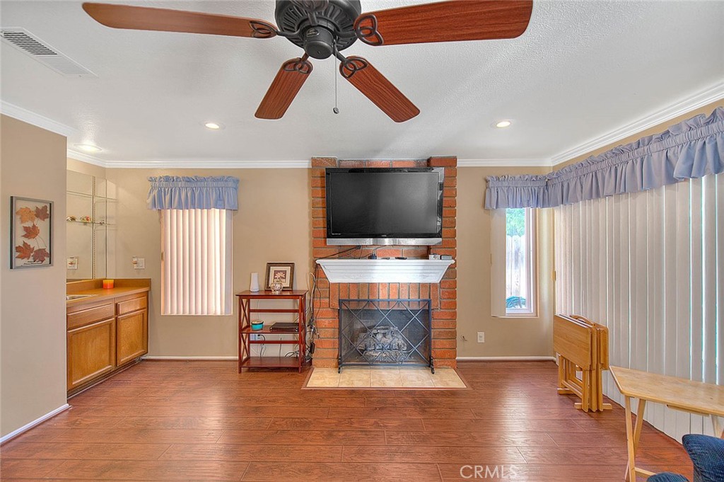 32 Rising Hill Road Phillips Ranch, CA 91766 - Photo 20 of 63 a view of living room with furniture wooden floor and window