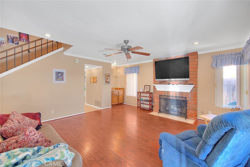 32 Rising Hill Road Phillips Ranch, CA 91766 - Photo 22 of 63 a living room with furniture and a flat screen tv
