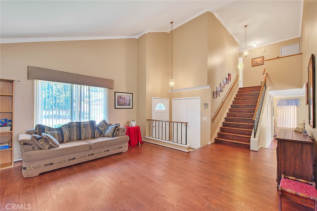32 Rising Hill Road Phillips Ranch, CA 91766 - Photo 3 of 63 a living room with furniture and a large window