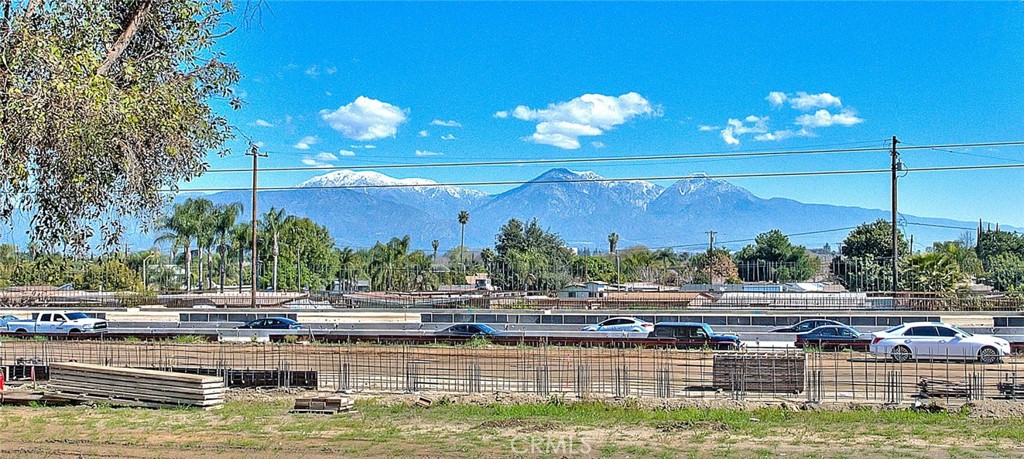 32 Rising Hill Road Phillips Ranch, CA 91766 - Photo 36 of 63 a view of a swimming pool with a lawn chairs and plants