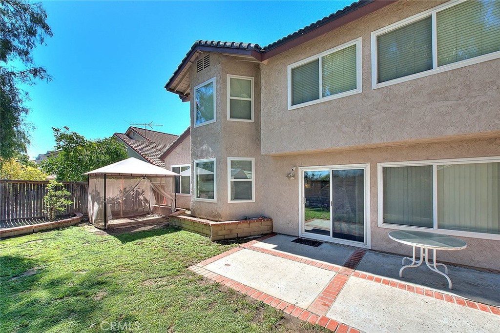 32 Rising Hill Road Phillips Ranch, CA 91766 - Photo 44 of 63 a view of a house with backyard and sitting area