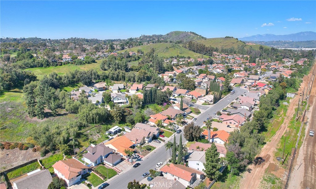 32 Rising Hill Road Phillips Ranch, CA 91766 - Photo 56 of 63 an aerial view of residential houses with outdoor space