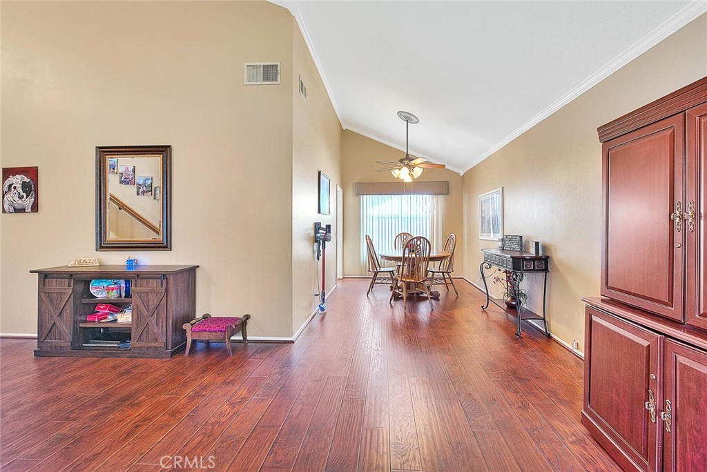 32 Rising Hill Road Phillips Ranch, CA 91766 - Photo 6 of 63 a living room with furniture and a wooden floor