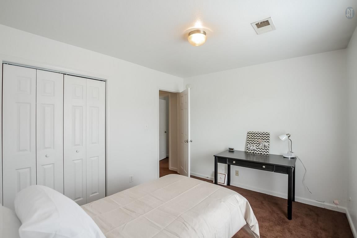 535 Lafayette Road, Unit H4 Clarksville, TN 37042 - Photo 17 of 24 a bedroom with a bed and a table