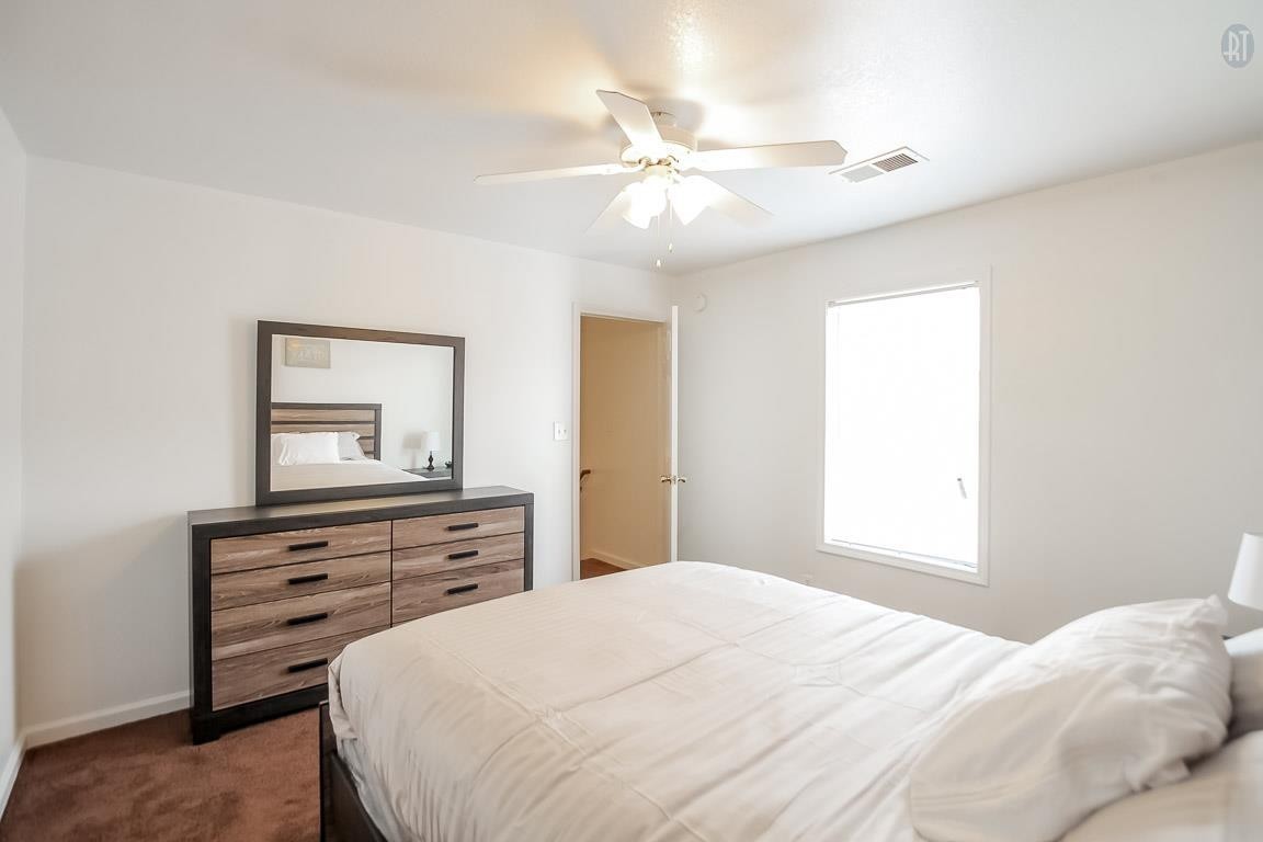 535 Lafayette Road, Unit H4 Clarksville, TN 37042 - Photo 24 of 24 a bedroom with a bed and a dresser
