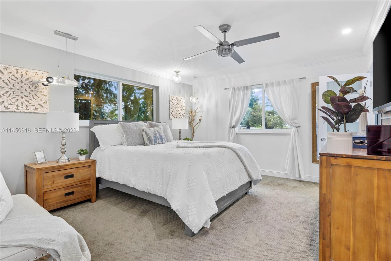 6410 Melaleuca Road Southwest Ranches, FL 33330 - Photo 16 of 50 a bed room with a bed and a window