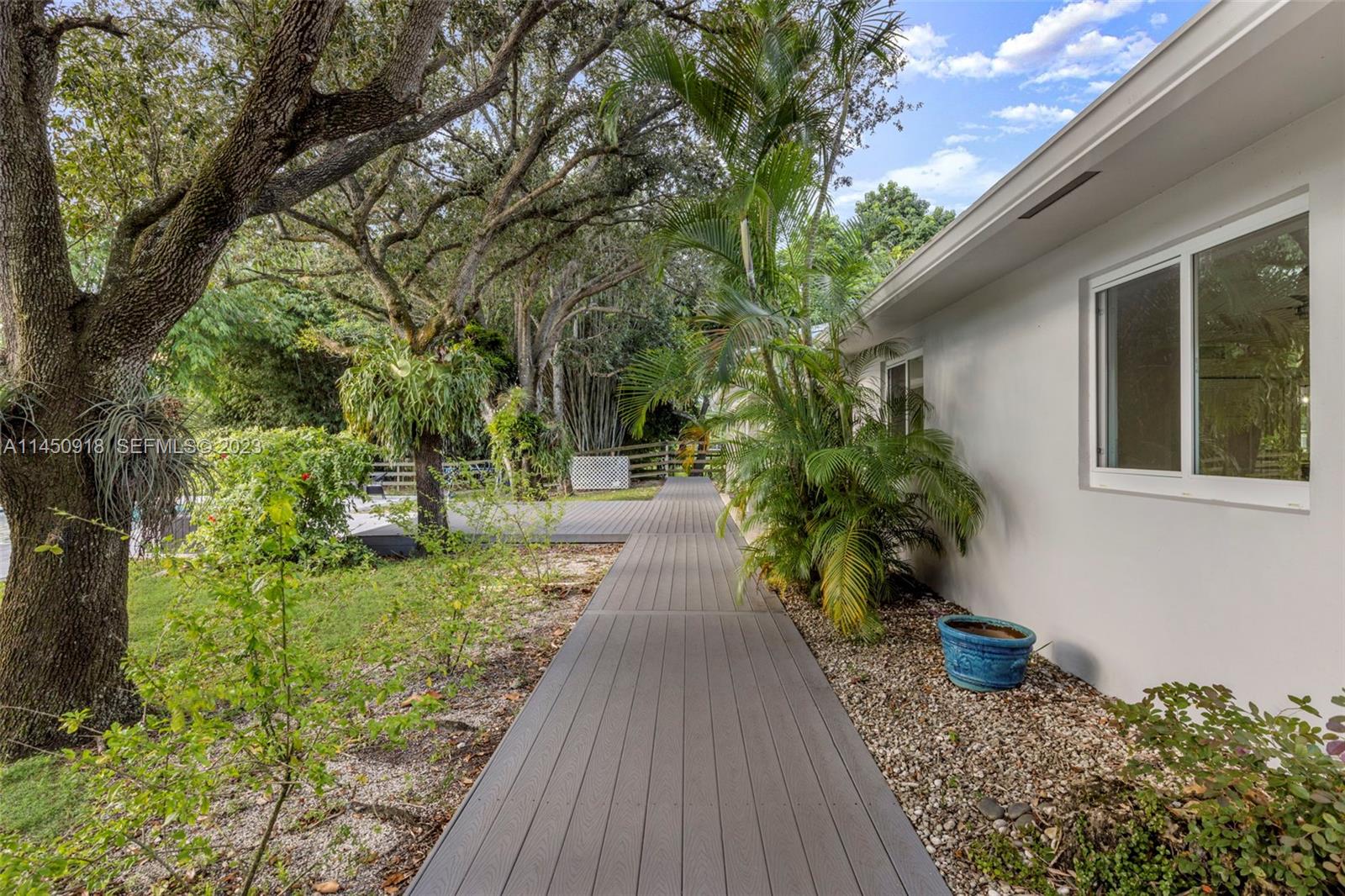 6410 Melaleuca Road Southwest Ranches, FL 33330 - Photo 42 of 50 a view of a house with backyard