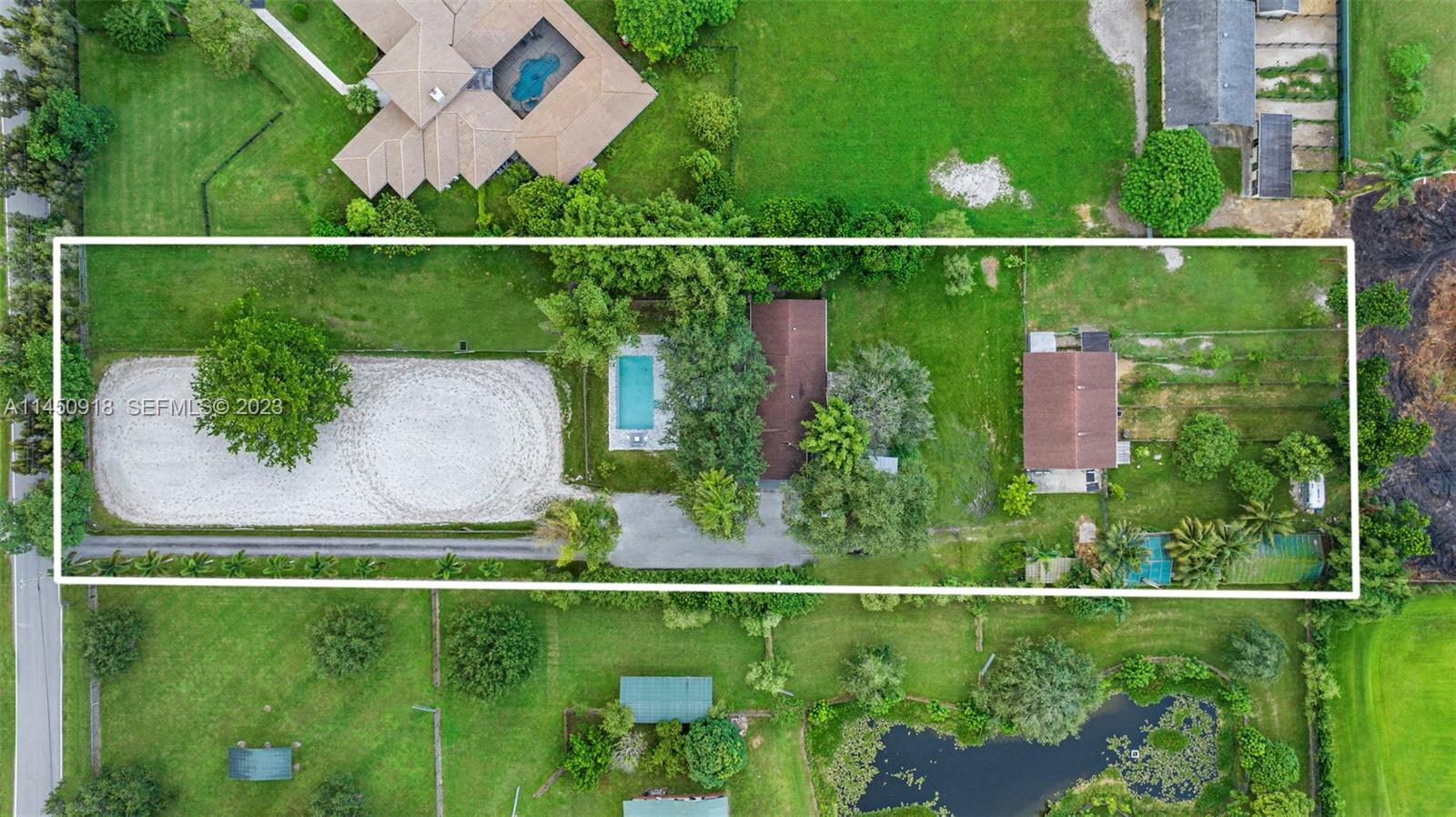 6410 Melaleuca Road Southwest Ranches, FL 33330 - Photo 44 of 50 an aerial view of a garden and lake view