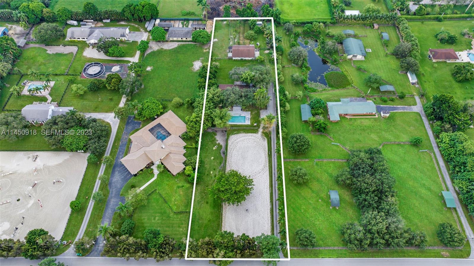 6410 Melaleuca Road Southwest Ranches, FL 33330 - Photo 46 of 50 an aerial view of multiple house