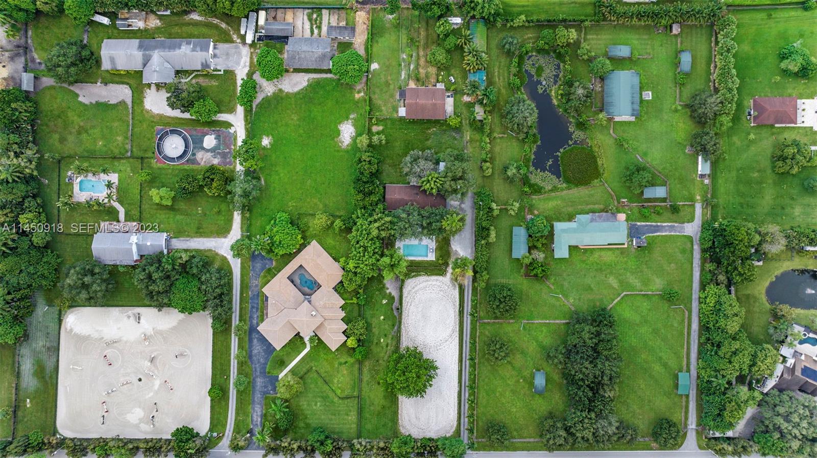 6410 Melaleuca Road Southwest Ranches, FL 33330 - Photo 47 of 50 an aerial view of multiple house