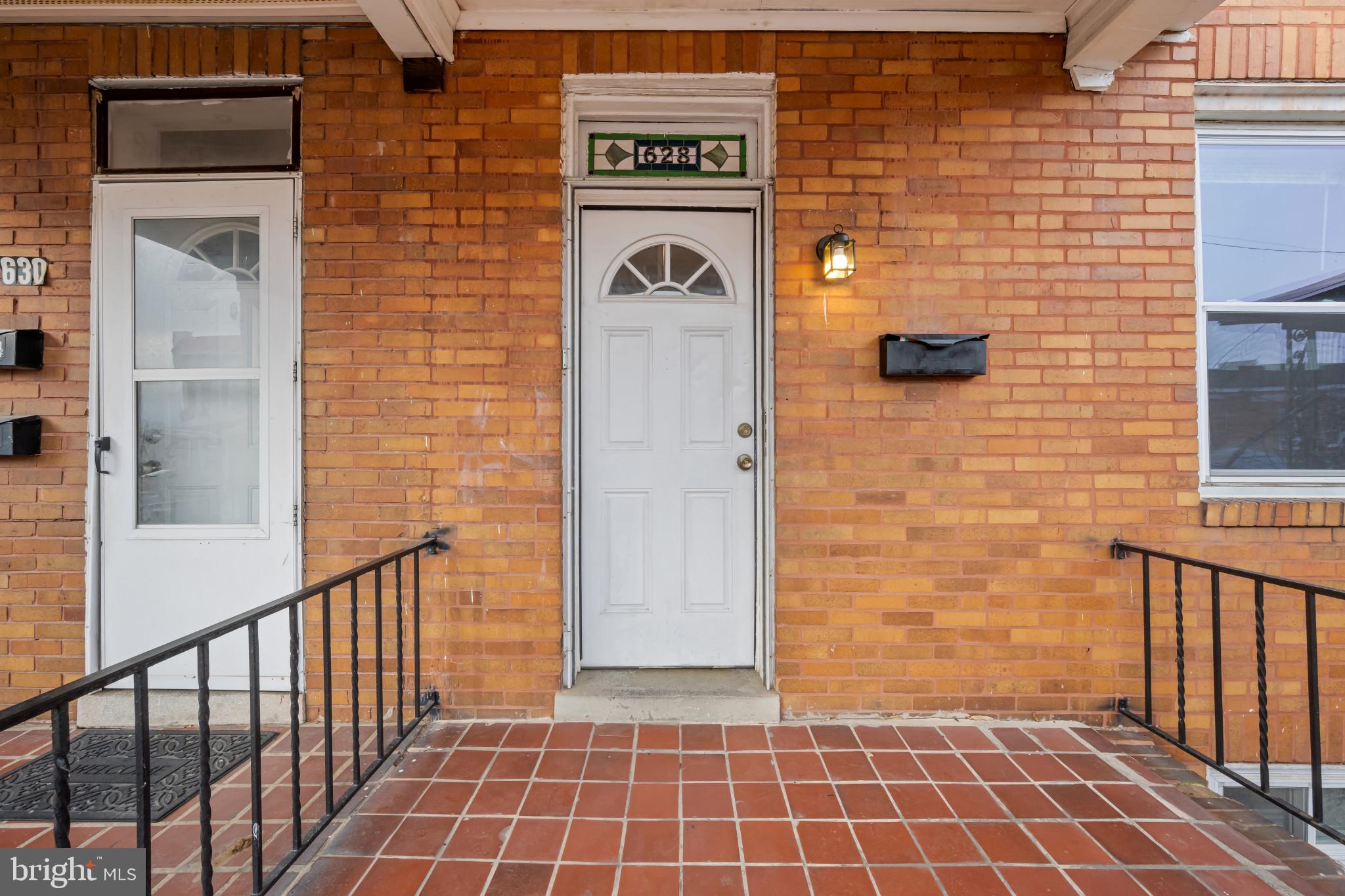 628 Savage Street Baltimore, MD 21224 - Photo 2 of 45 a view of a door and a door