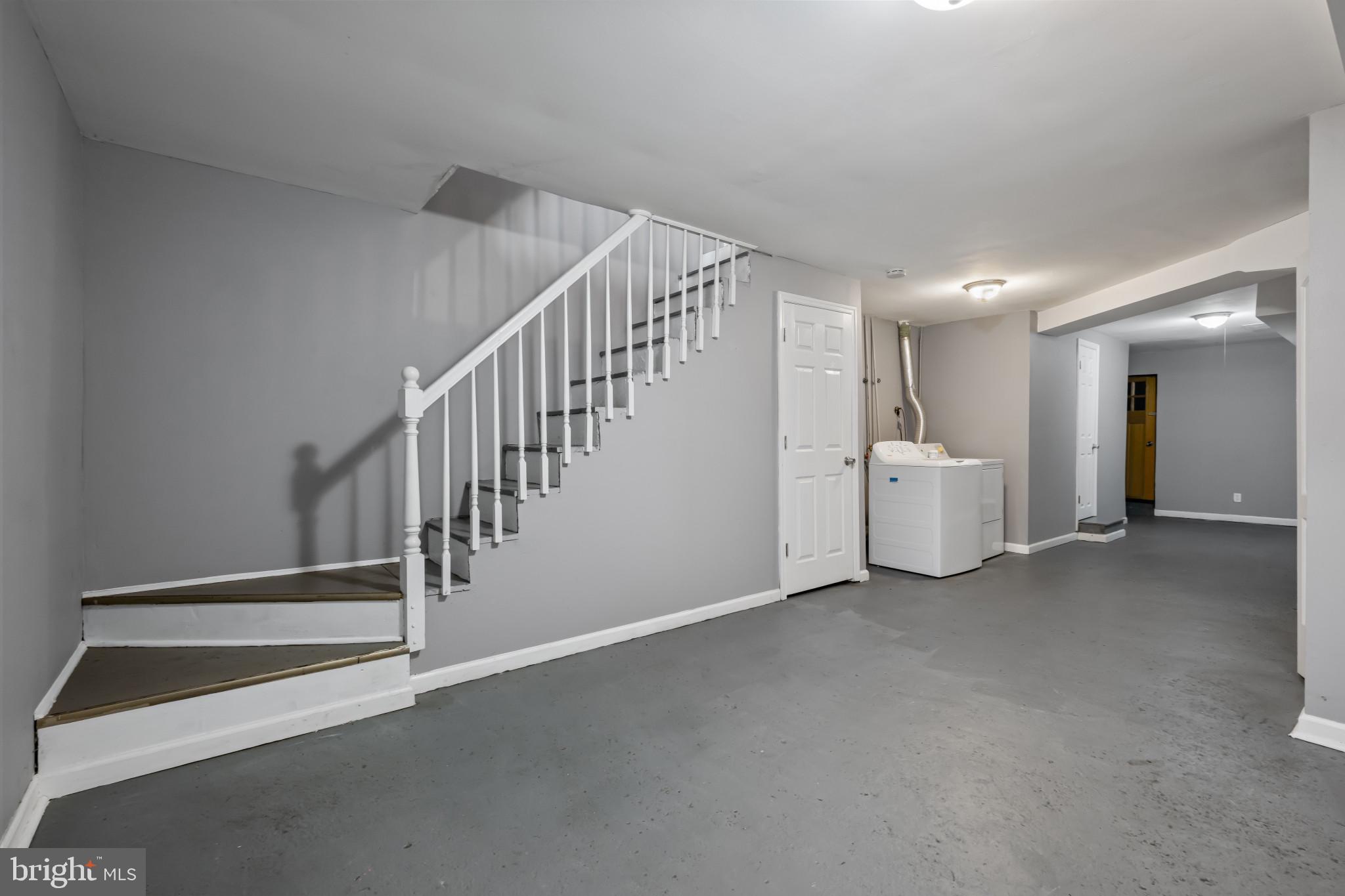 628 Savage Street Baltimore, MD 21224 - Photo 23 of 45 a view of an empty room with white walls