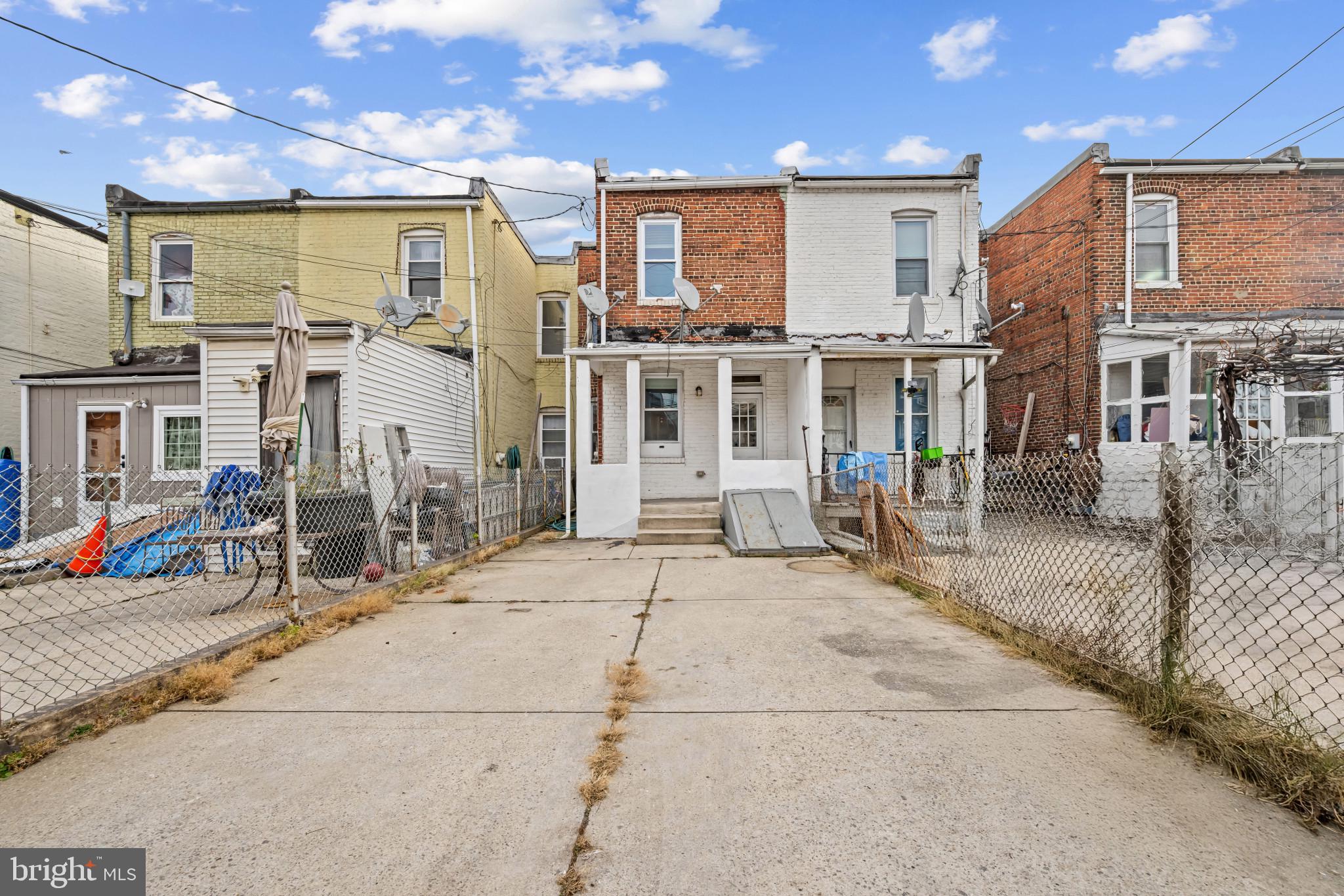 628 Savage Street Baltimore, MD 21224 - Photo 29 of 45 a view of a building with a patio