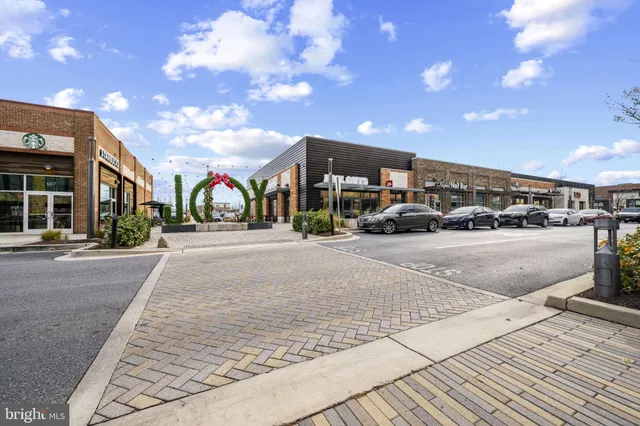 a group of cars parked in front of building