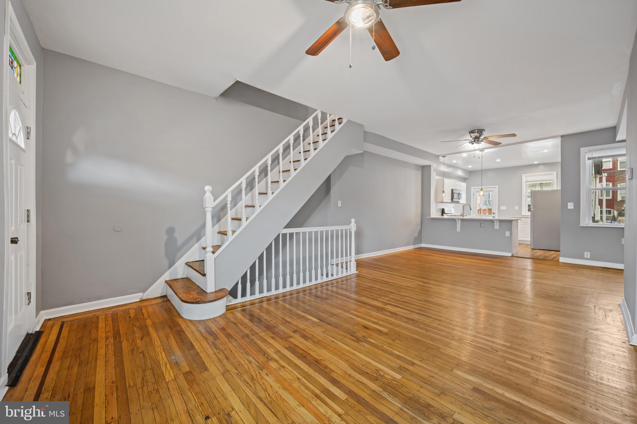 628 Savage Street Baltimore, MD 21224 - Photo 6 of 45 a view of entryway and hall with wooden floor