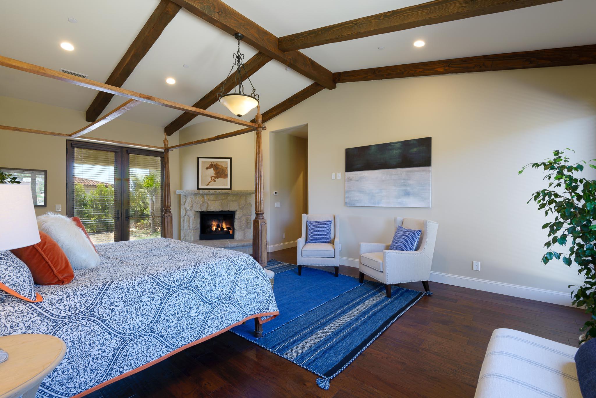 1210 Via Brigitte Santa Barbara, CA 93111 - Photo 6 of 15 a bedroom with a bed and wooden floor
