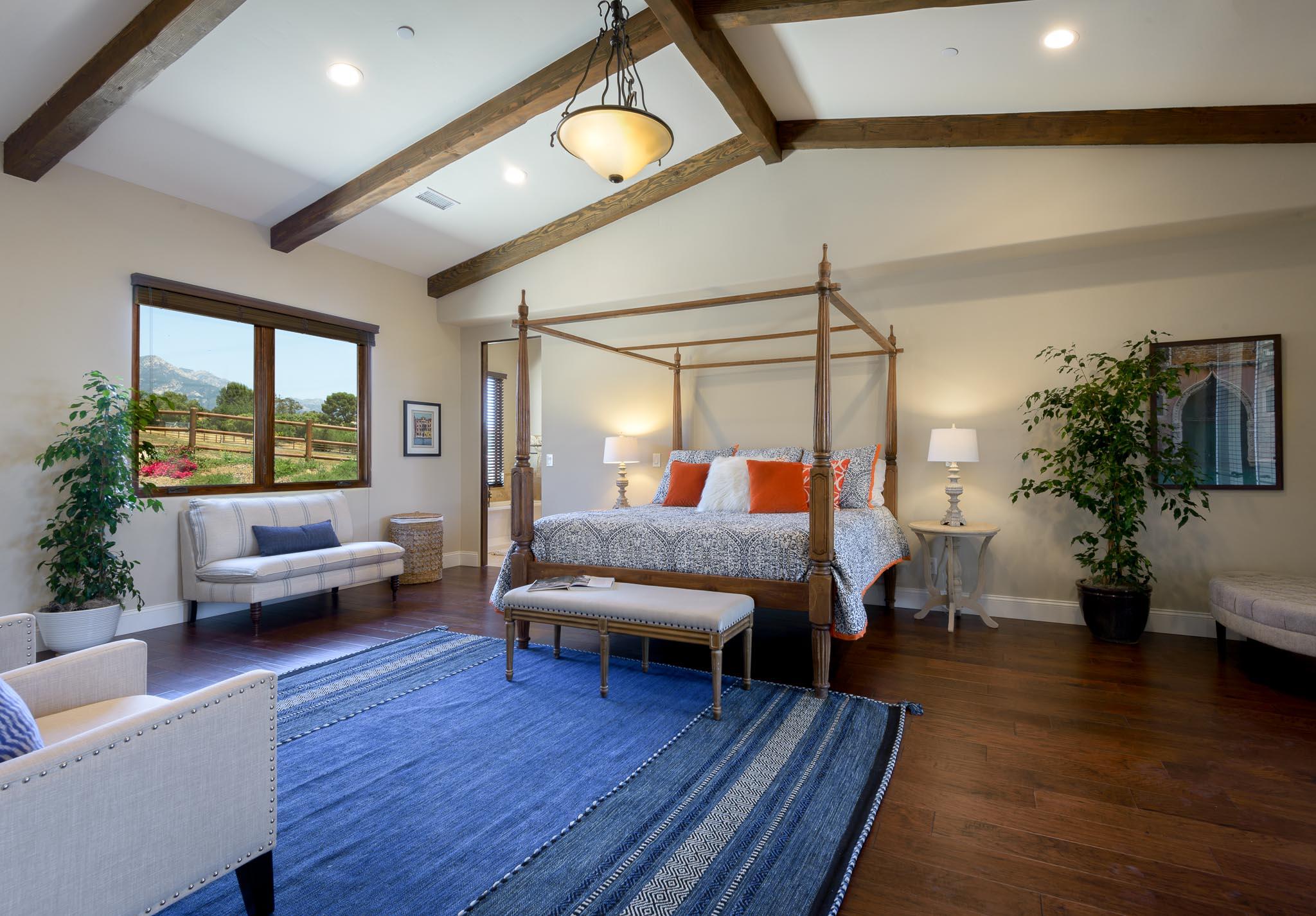 1210 Via Brigitte Santa Barbara, CA 93111 - Photo 7 of 15 a bedroom with furniture and a wooden floor