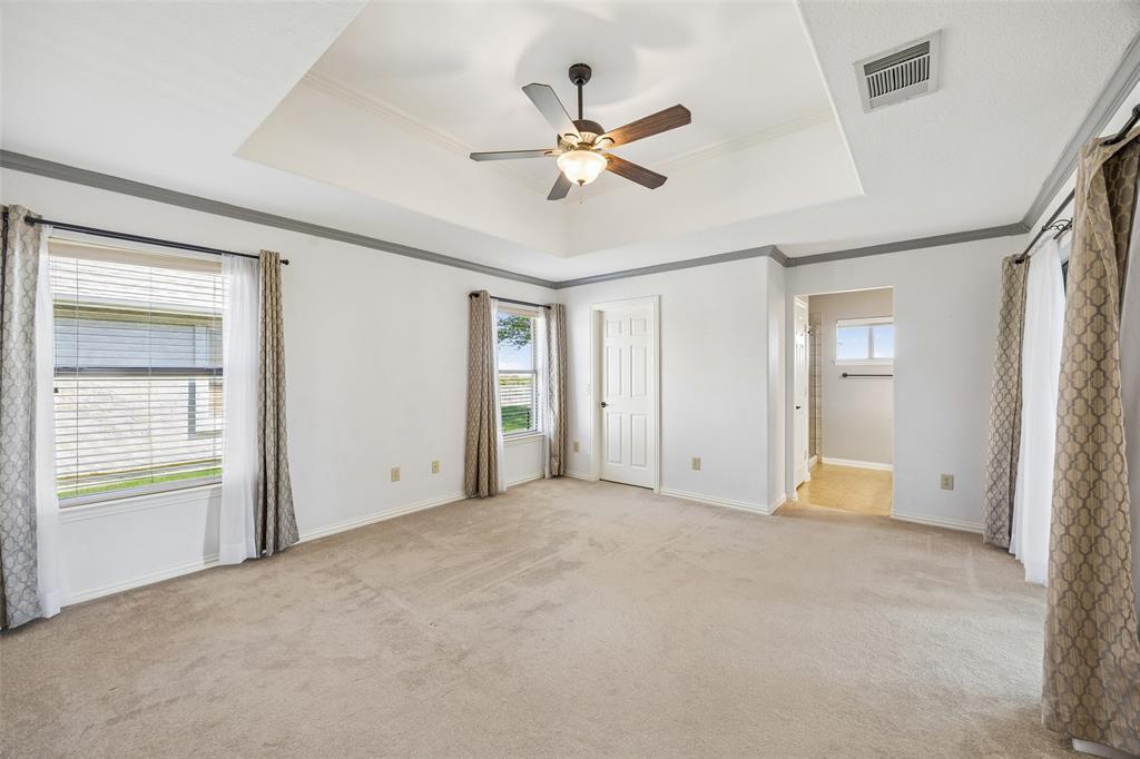 9221 Perimeter Street Denton, TX 76207 - Photo 17 of 36 a view of an empty room with a window
