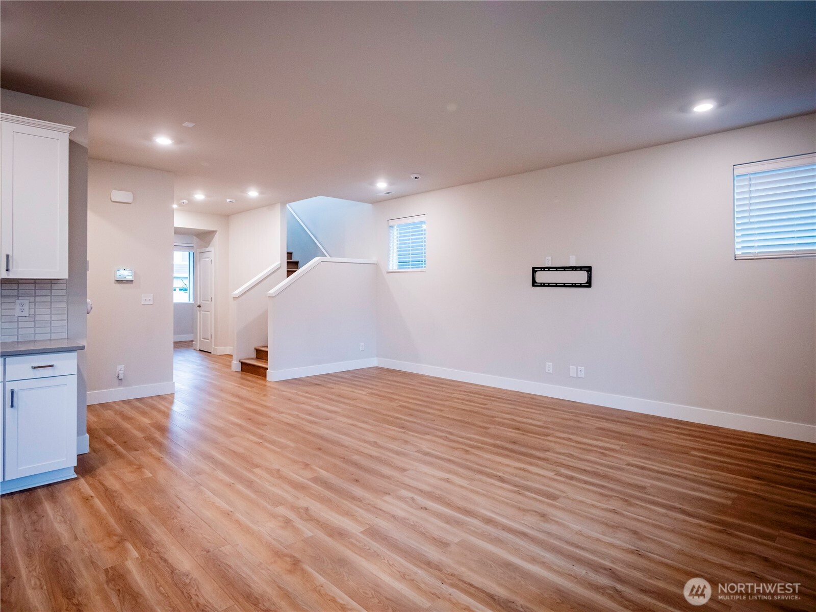 5393 Century Place Northeast Lacey, WA 98516 - Photo 12 of 33 a view of empty room with wooden floor