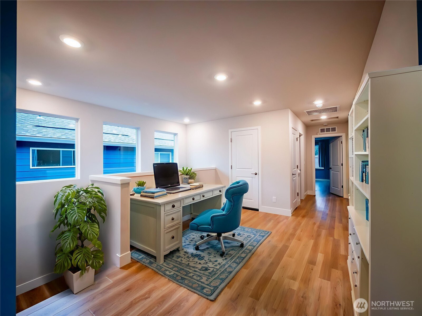 5393 Century Place Northeast Lacey, WA 98516 - Photo 16 of 33 a living room with a couch and a table with wooden floor