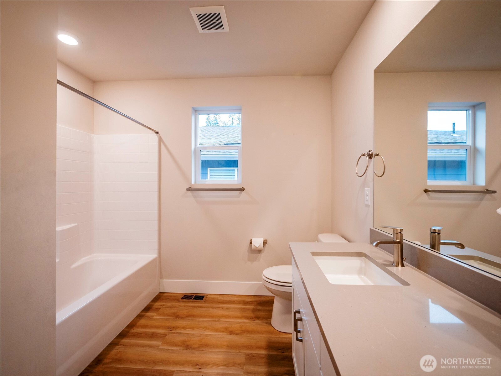 5393 Century Place Northeast Lacey, WA 98516 - Photo 18 of 33 a bathroom with a sink a bathtub and a mirror