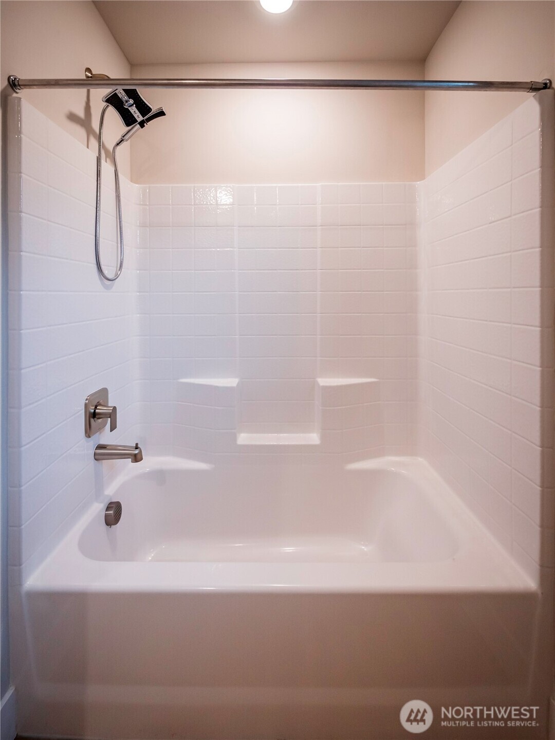 5393 Century Place Northeast Lacey, WA 98516 - Photo 19 of 33 a bathroom with a bath tub with a shower