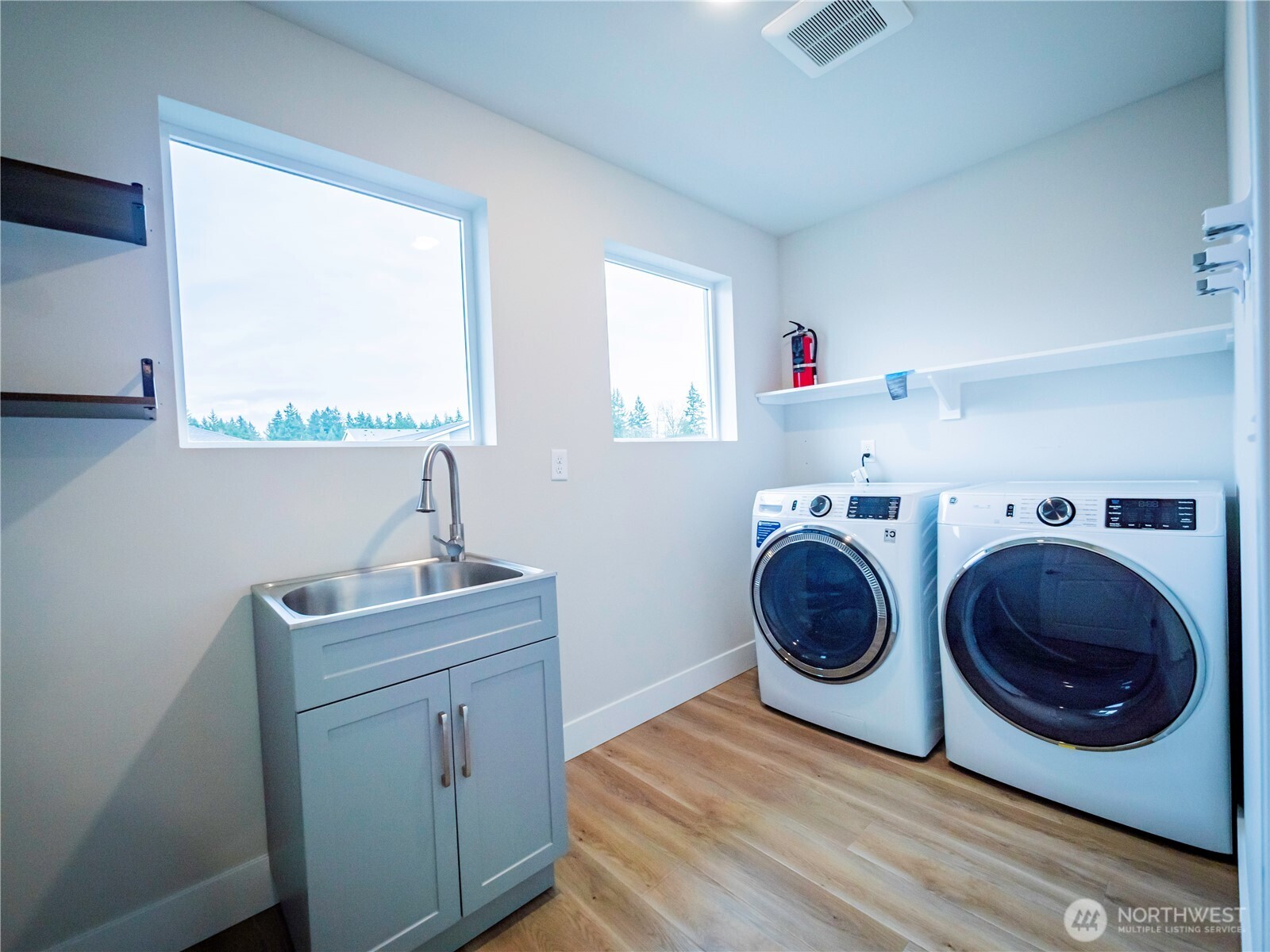 5393 Century Place Northeast Lacey, WA 98516 - Photo 20 of 33 a utility room with sink dryer and washer