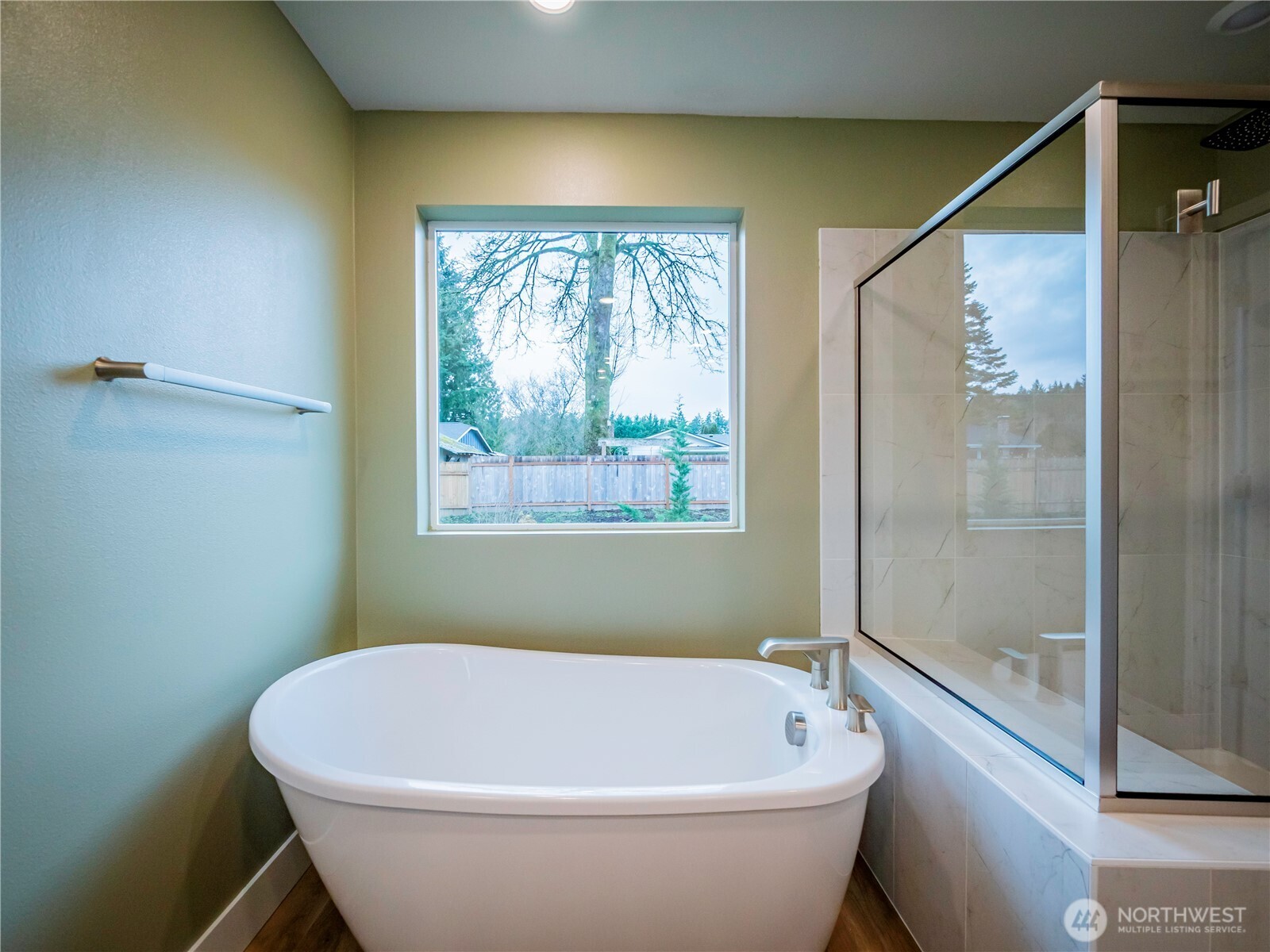 5393 Century Place Northeast Lacey, WA 98516 - Photo 27 of 33 a white bath tub sitting next to a window
