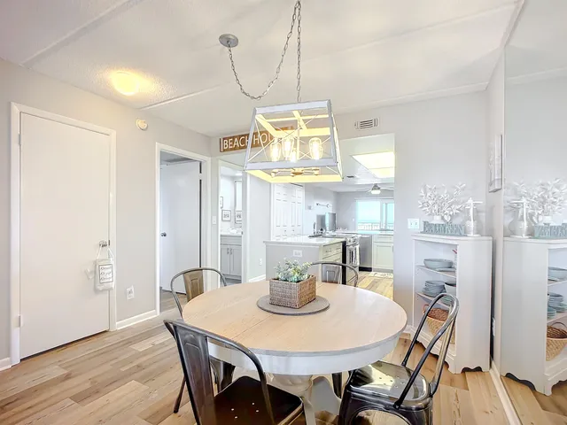 a kitchen with stainless steel appliances a sink stove and cabinets