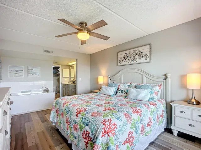 a balcony with chairs and a table