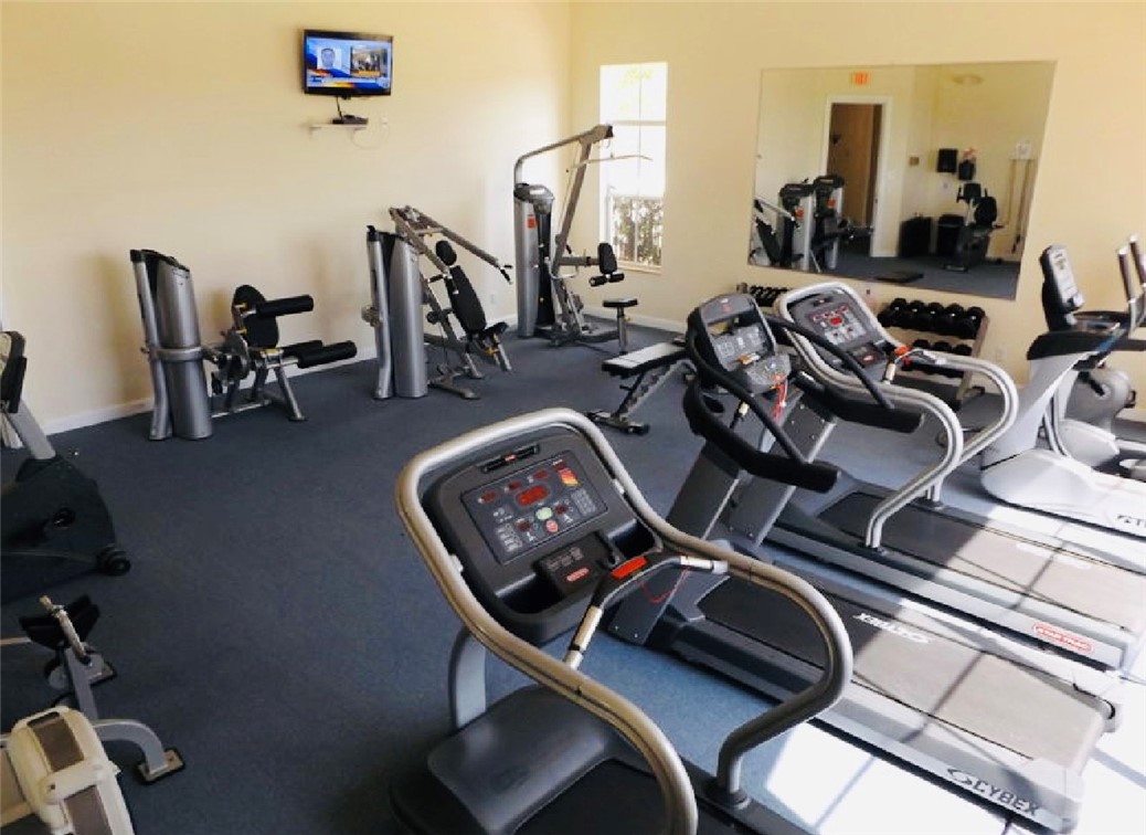 5837 Spanish River Road Fort Pierce, FL 34951 - Photo 28 of 34 a view of a room with gym equipment
