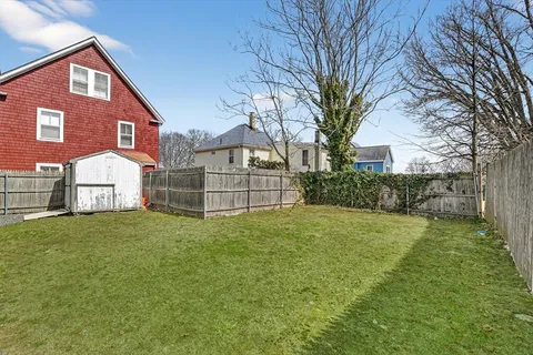 a view of backyard of house