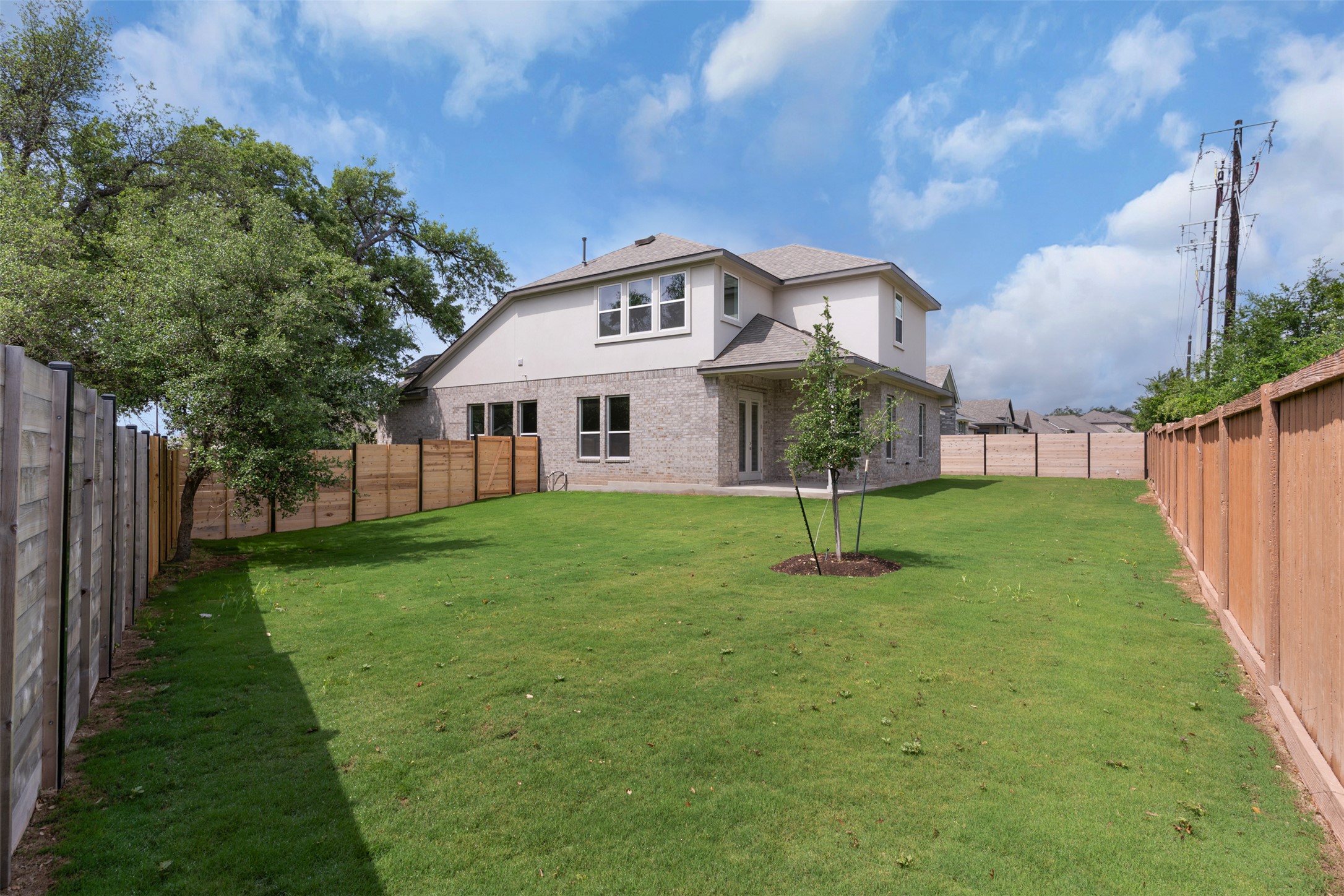 316 Ridgewell Loop Georgetown, TX 78633 - Photo 19 of 25 a front view of a house with a garden