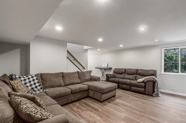 a living room with furniture and a couch