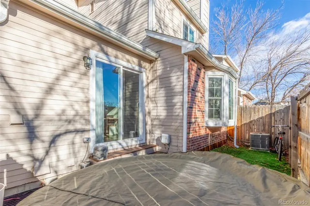 a view of a brick building with many windows