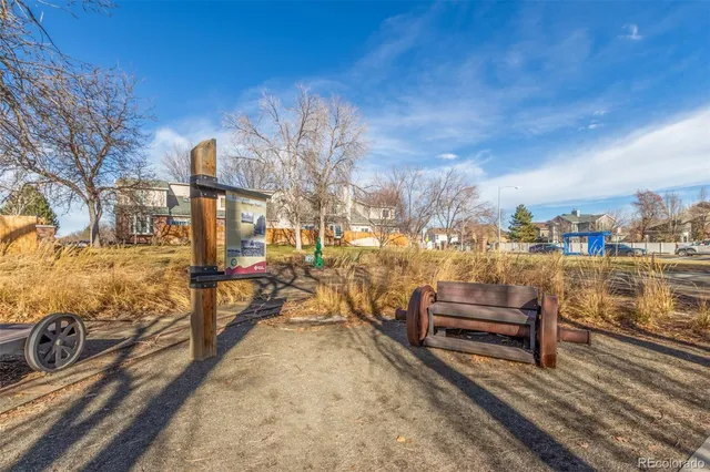 a view of a yard with sitting area