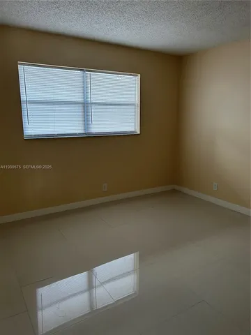 an empty room with closet