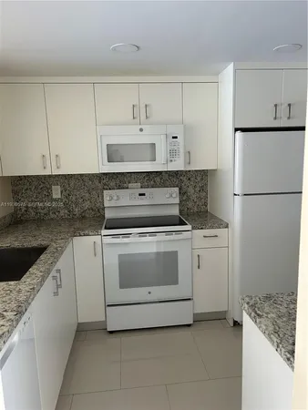 $1,780 | 7910 North Colony Circle, Unit 209, Tamarac, FL 33321