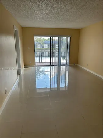 $1,780 | 7910 North Colony Circle, Unit 209, Tamarac, FL 33321