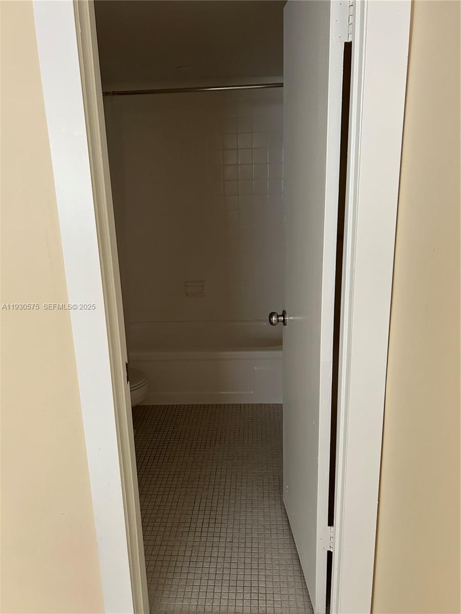 7910 North Colony Circle, Unit 209 Tamarac, FL 33321 - Photo 8 of 19 a view of closet