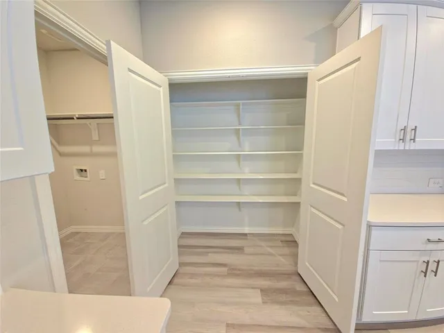 a view of a walk in closet