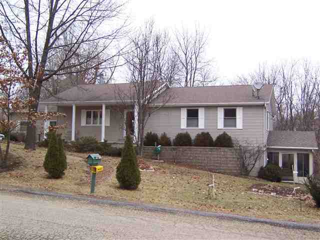 1 Canterbury Road Mackinaw, IL 61755 - Photo 1 of 1 a front view of a house with a yard